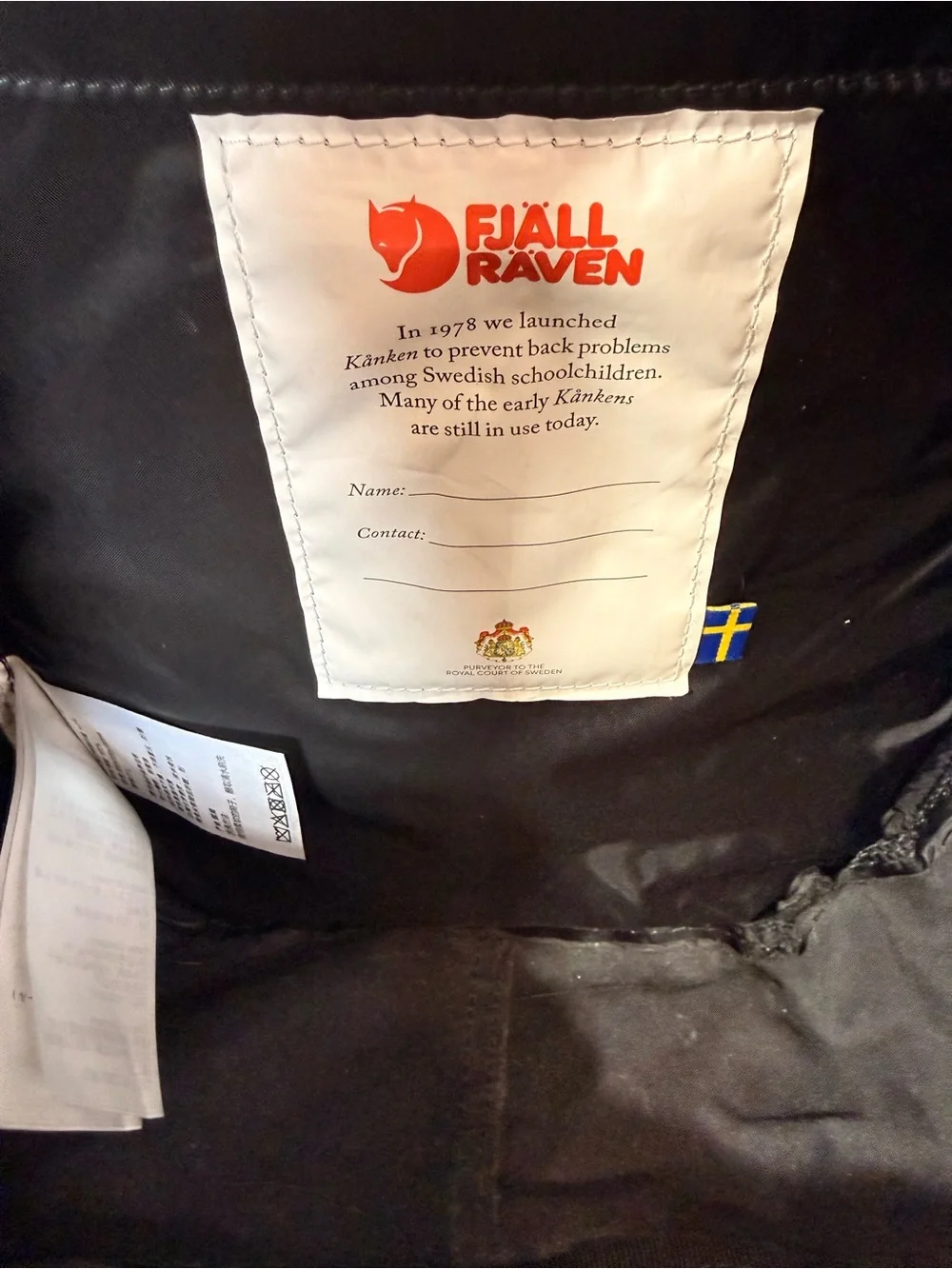 Fjallraven Kanken Mini Backpack in Black with Red Logo